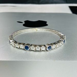 18k WG DIAMONDS AND SAPHFIRE BANGLE BRACELET $5000